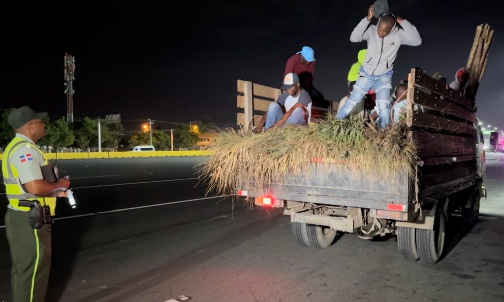 HAITIANOS EN CAMIÓN